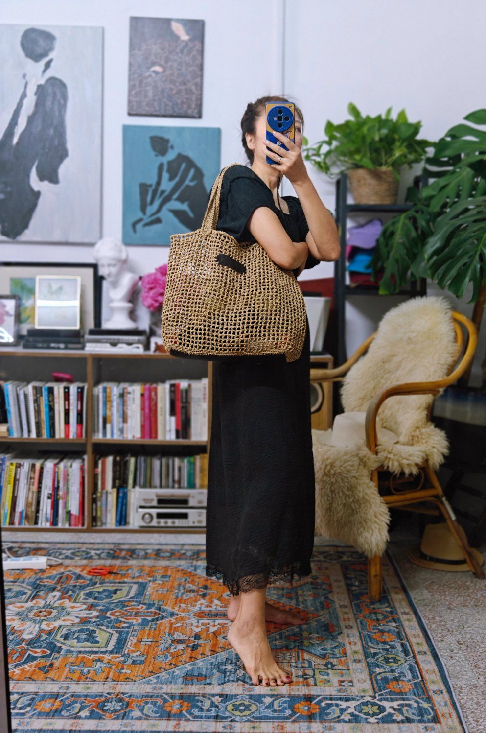 Real customer styling an oversized tan crochet tote at home