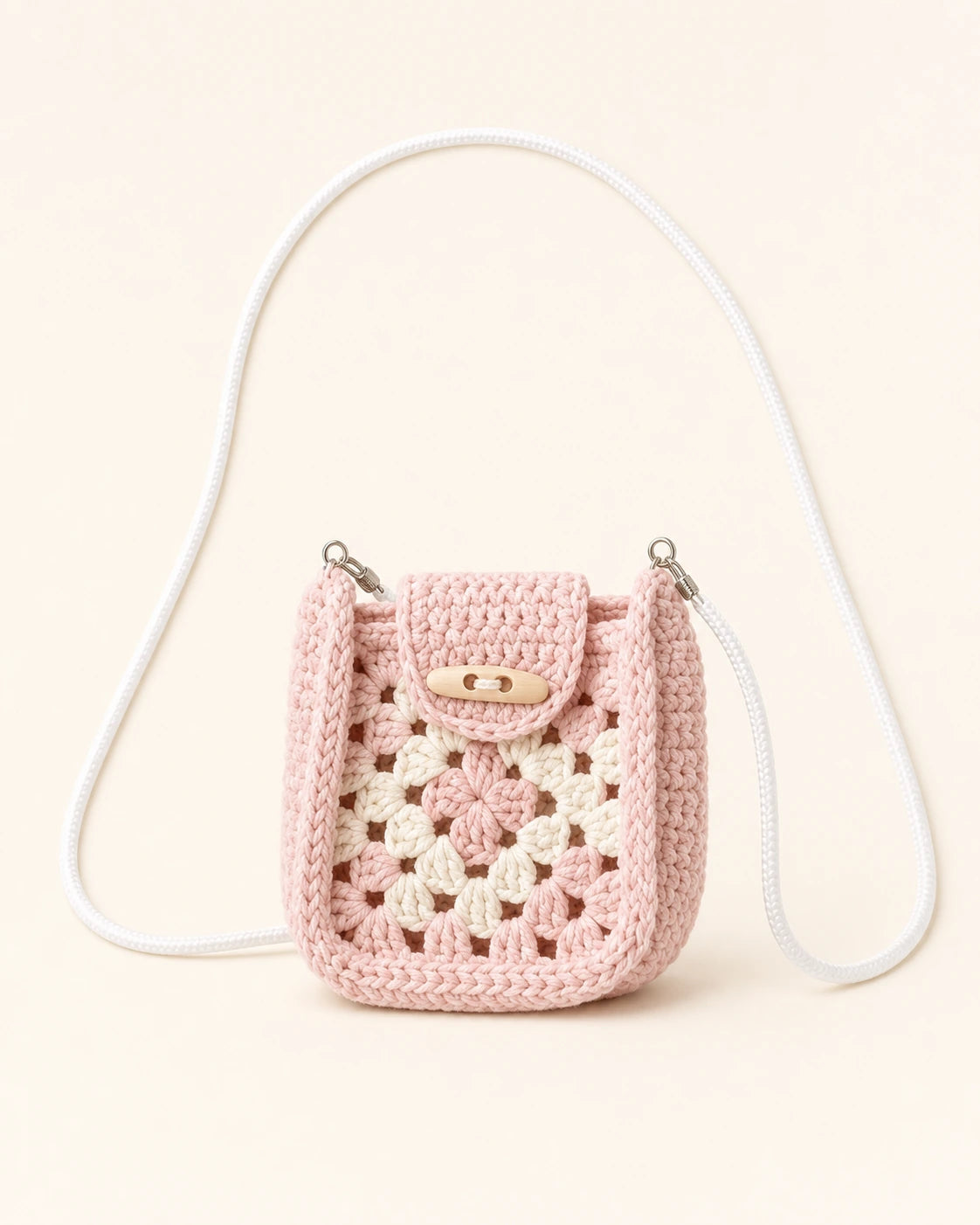 A small pink crochet bag