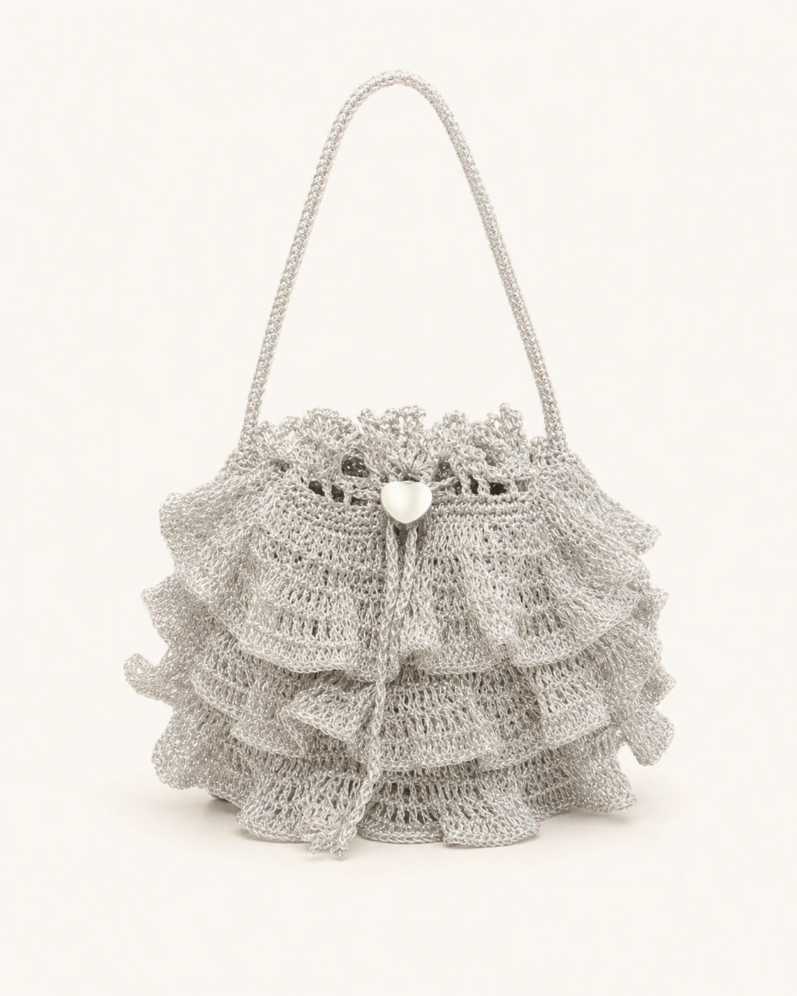 A silver ruffle crochet bag